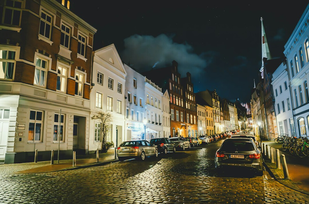 Old city street with historic buildings in the evening